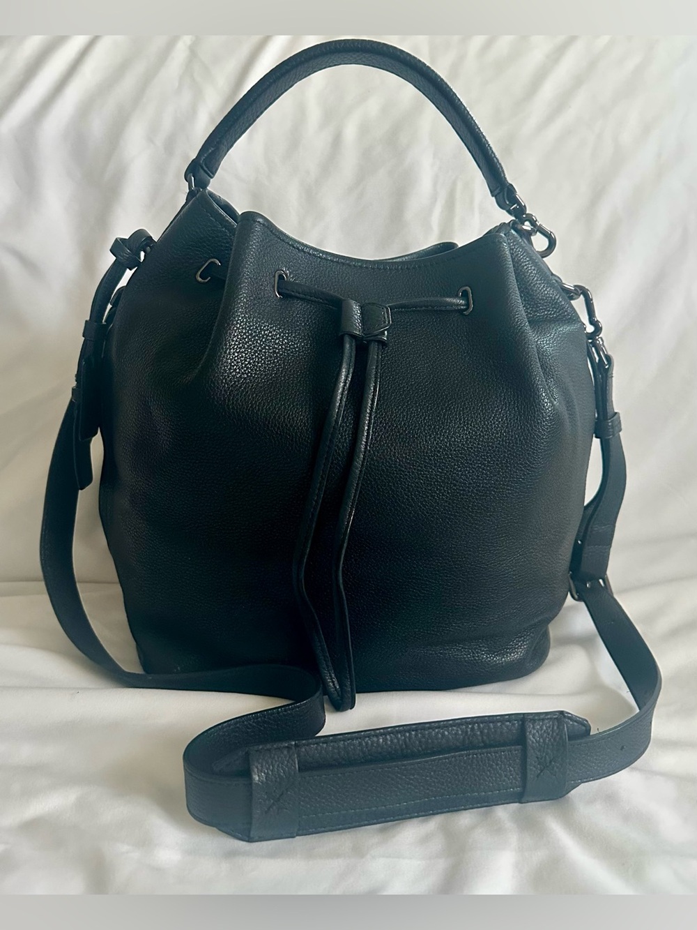 TUMI Noho Georgie Pebbled Leather Drawstring Bucket Bag - (Dust bag included)